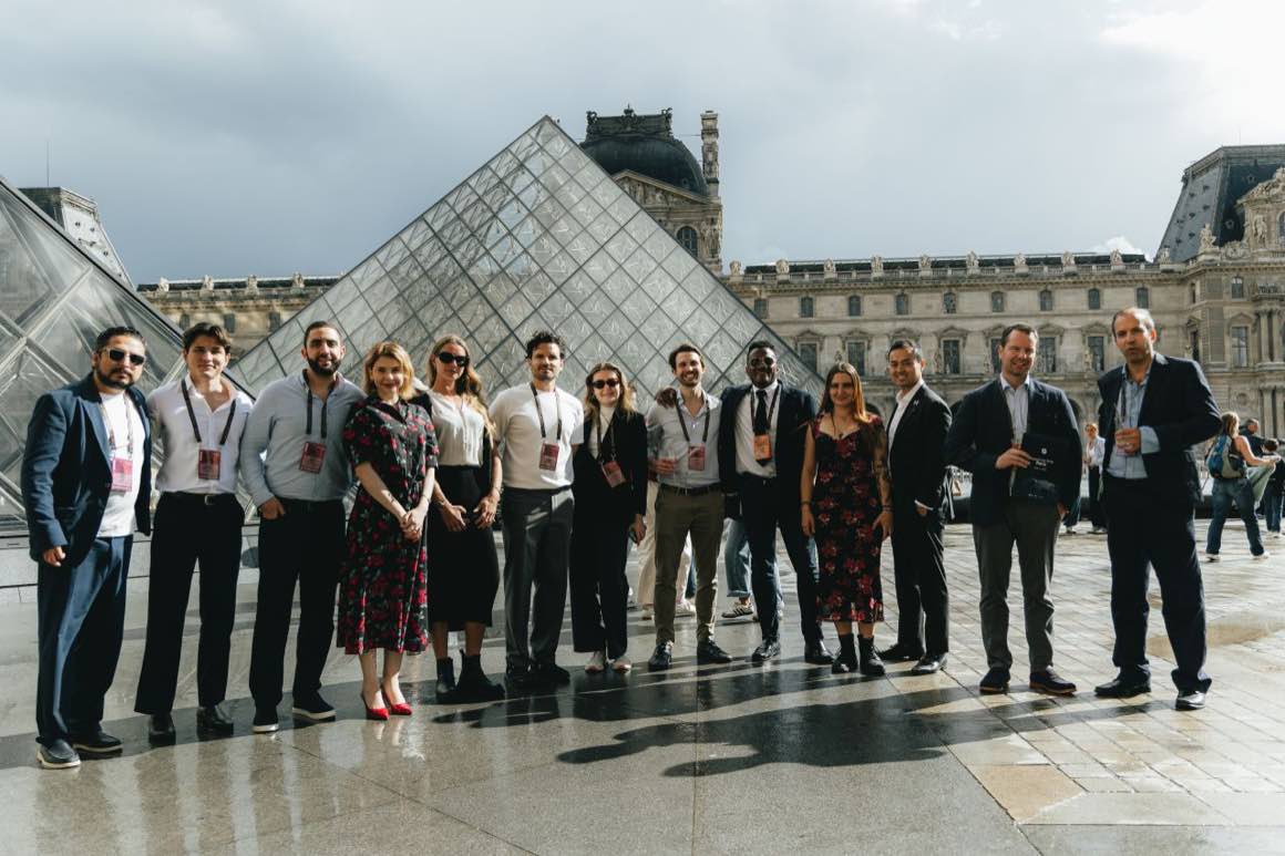 Capital Markets Series attendees at Proof of Talk in Paris, in front of the Louvre pyramid