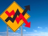 Road sign with rising and falling arrows